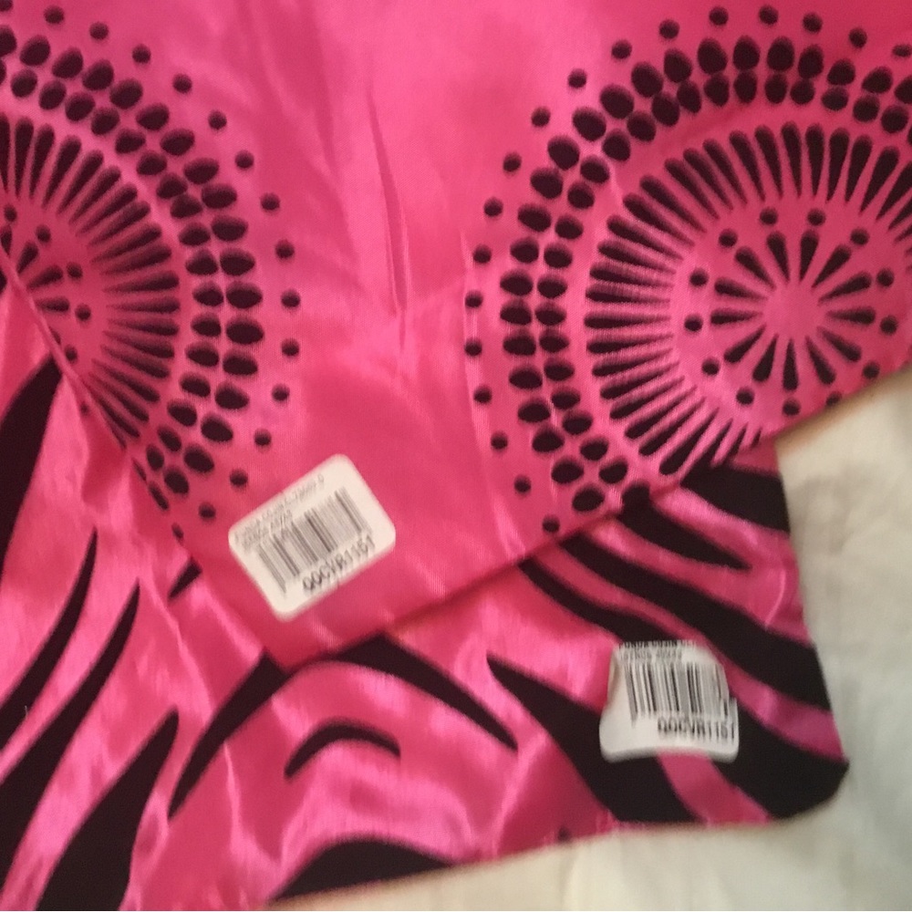 Two pink/patterned couch pillow cases. - Picture 3 of 4